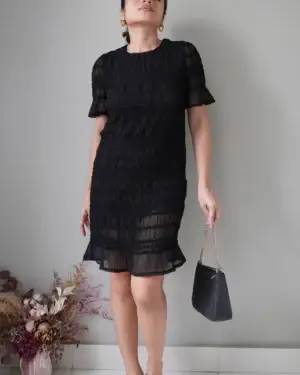 Versatile textured black dress that can be worn for dinners or a lovely gal afternoon date