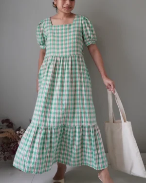 Cottage-core plaid dress with the prettiest edgy neckline and puffed sleeves, ruffle hem finish detail