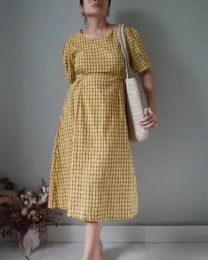 County plaid pattern linen dress in yellow, flaw at other ribbon as there are loose stitches