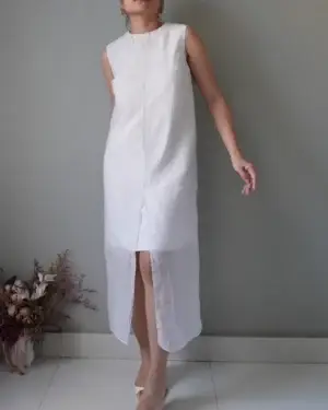 White boxy dress with stylish sheer overlay