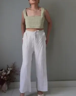 Relaxed linen pants with pockets, back waist part is stretchable and has a tie in front