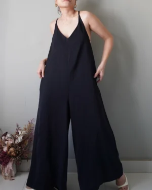 Wide legged black overalls with pockets that will remind you of quaint flea markets