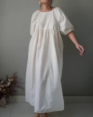 Milk puffed sleeved dress with a self tie back ribbon