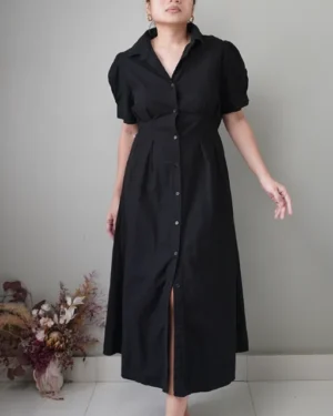 Timeless black button down linen dress with a nicely fitted bodice and self tie back ribbon
