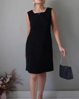 Classic little black dress with an edgy neckline