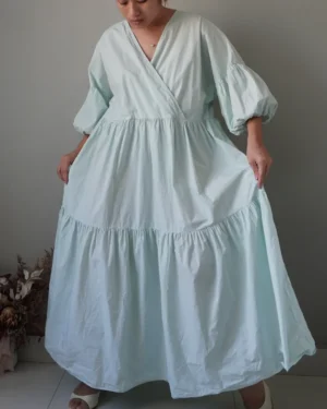 Light shade of tiffany blue dress, bell sleeves detail with wide tiered finish